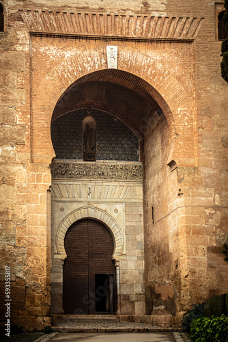 Vertical photo of the Justice Gate of the Alhambra  Nasrid style in Granada  Spain