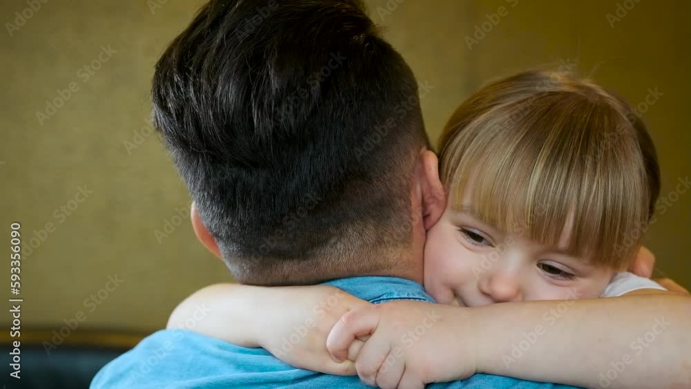 Dad and daughter. Dad hugs daughter. parent and child. 