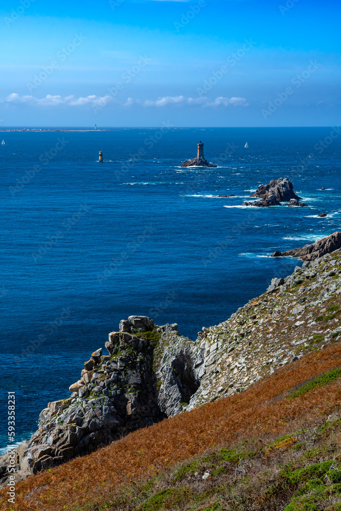 Spectacular Cliffs And Lighthouse At Peninsula Pointe Du Raz At The Finistere Atlantic Coast In Brittany, France