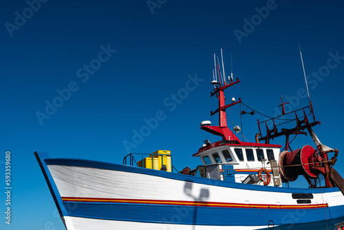 Bild auf Leinwand Fishing Boat In The Harbor Docks Of Finistere City Guilvinec At The Coast Of Atl