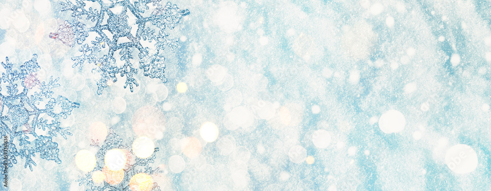 Christmas winter background, banner with copy space for text - view of decorative snowflakes on snow background, double exposure photo Christmas winter background, banner with copy space for text - view of decorative snowflakes on snow background, double exposure photo