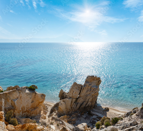 Summer sunshiny sandy beach and rocky coast near Platanitsi Beach (Sithonia Peninsula, Chalcidice, Greece). photo