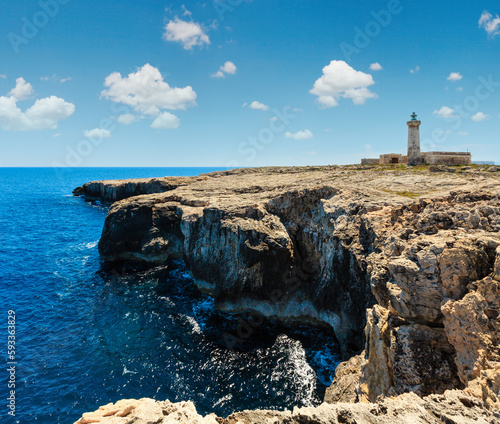 Summer Capo Murro di Porco old abandoned lighthouse - Syracuse, Sicily, Italy, Mediterranean sea. photo