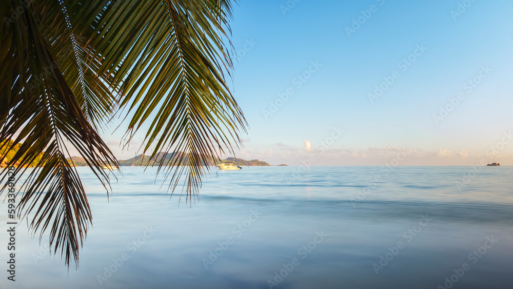 Fototapeta premium Nature landscape view of beautiful tropical beach and sea in sunny day. Beach sea space area