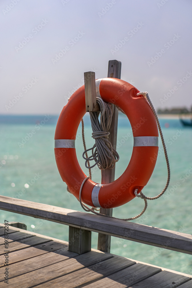 Lifebuoy at the pier in the Maldives