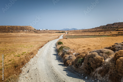 Rural narrow dirt road somewhere on Milos island  Greece