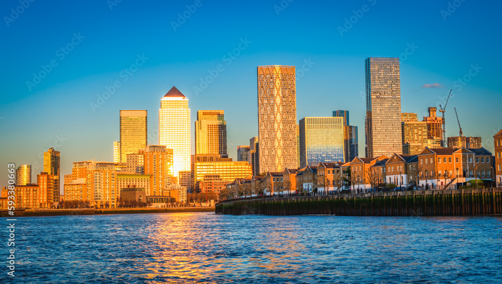 Fototapeta premium view of Canary Wharf during sunset , financial hub in London at sunset