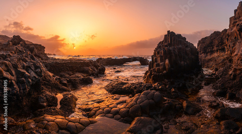 El Hierro Island. Canary Islands, landscape of volcanic rocks in the natural pool of Charco Azul at sunset © unai