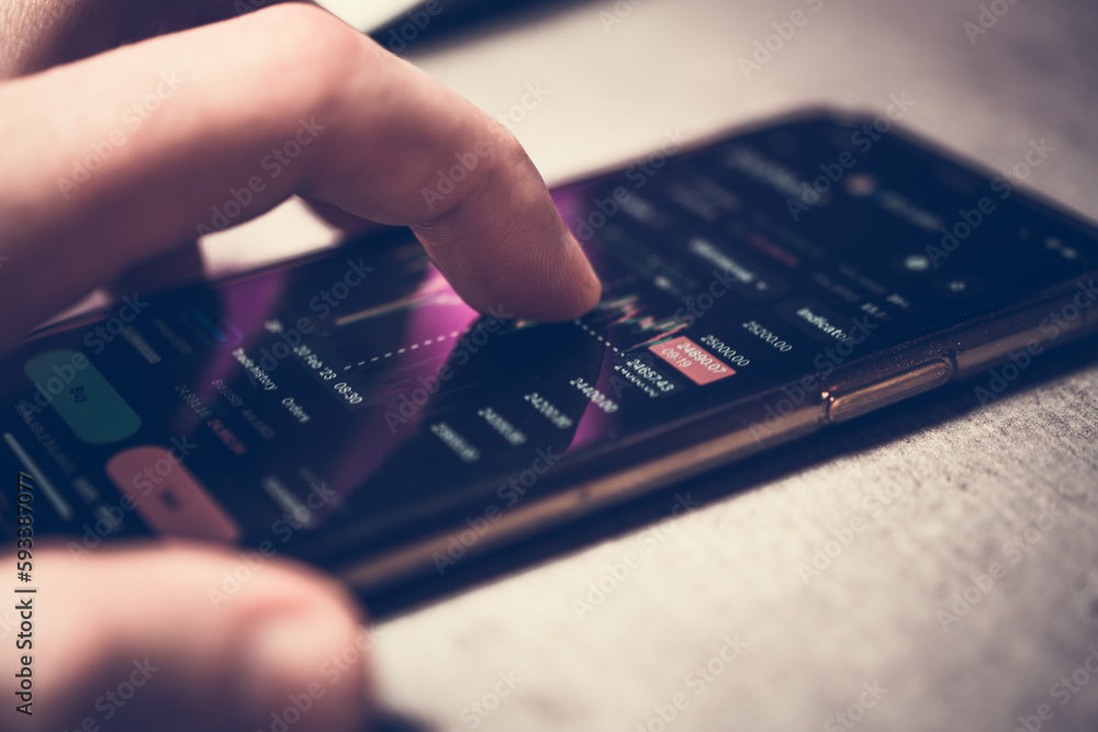 Fototapeta premium Cryptocurrency Trading Chart on Mobile Screen