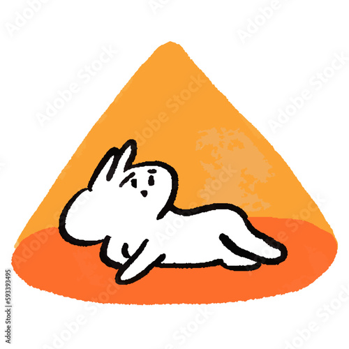 スポットライトに当たる寂しげなうさぎ