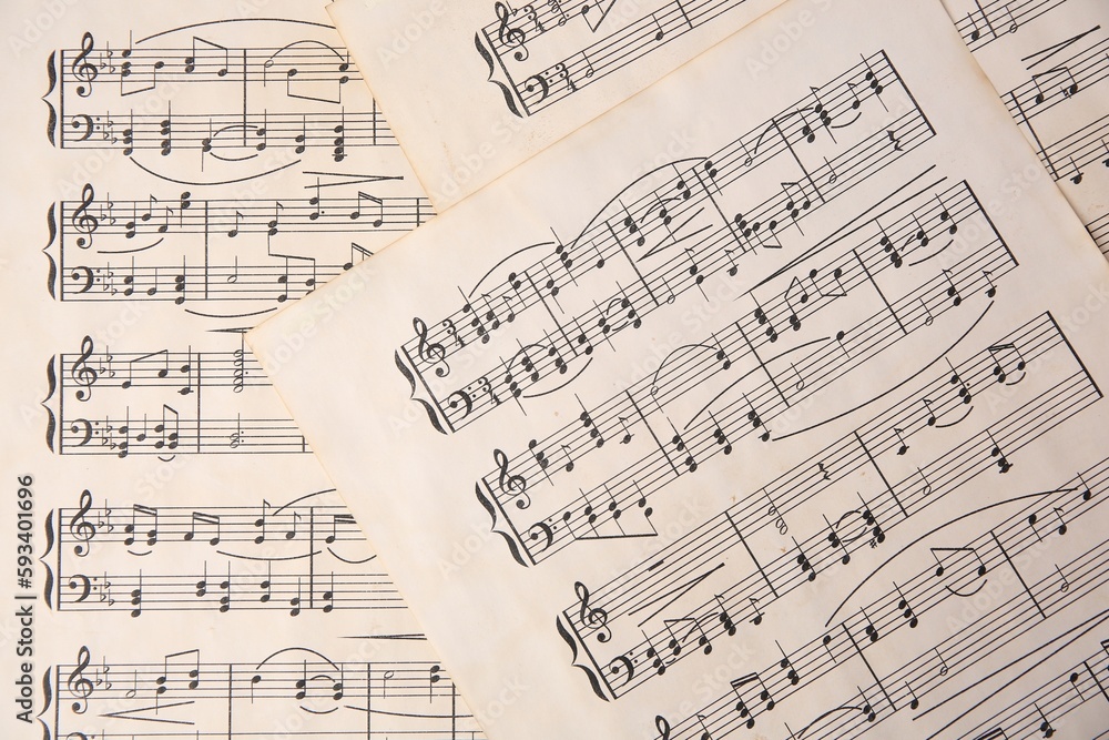 Obraz premium Sheets of paper with different notes as background, top view