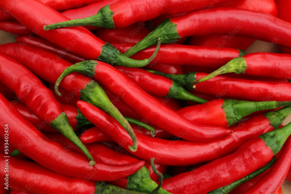 Red hot chili peppers as background, top view Red hot chili peppers as background, top view
