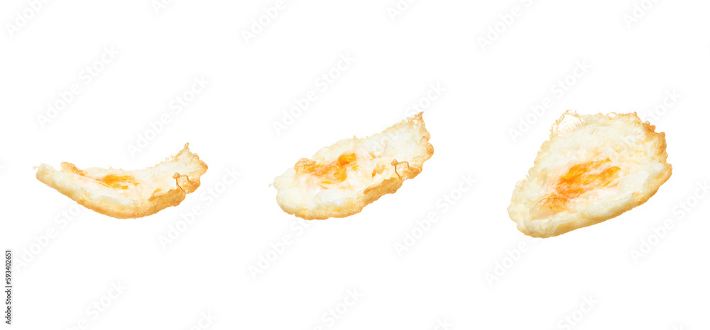 Fried Egg fly up from pan, fried egg float abstract and spin splash in air. Fried Egg is healthy ready food. White background Isolated high speed shutter, freeze stop motion photo Fried Egg fly up from pan, fried egg float abstract and spin splash in air. Fried Egg is healthy ready food. White background Isolated high speed shutter, freeze stop motion photo