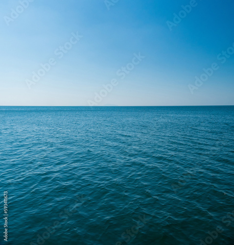 Vertical front view landscape Blue sea and sky blue background morning day look calm summer Nature tropical sea Beautiful  ocen water travel 