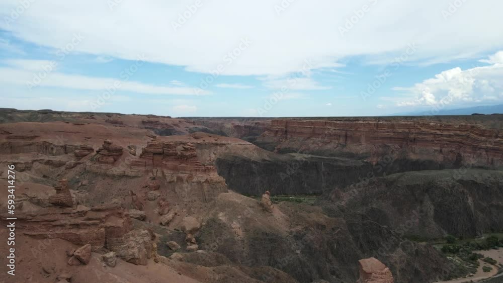 Charyn Canyon Gorge. Against the background of a cloudy sky Charyn Canyon Gorge. Against the background of a cloudy sky