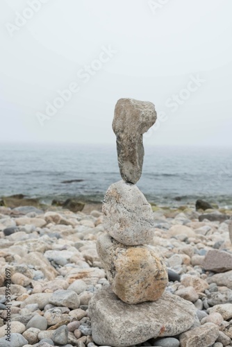 stones stacked and balanced on the beach