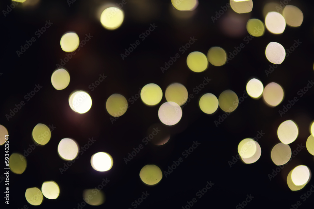Obraz premium Abstract bokeh background. Golden bokeh circles on dark blue background. Layer overlay.