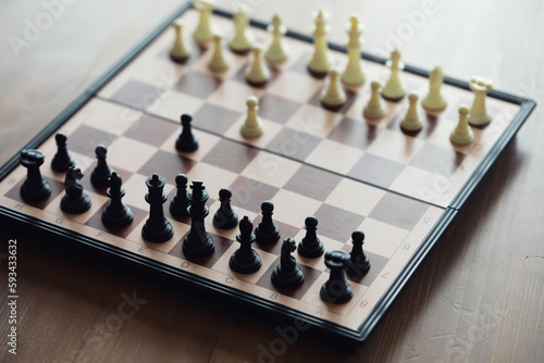 Hand playing game of chess, competition, strategy, battle, play