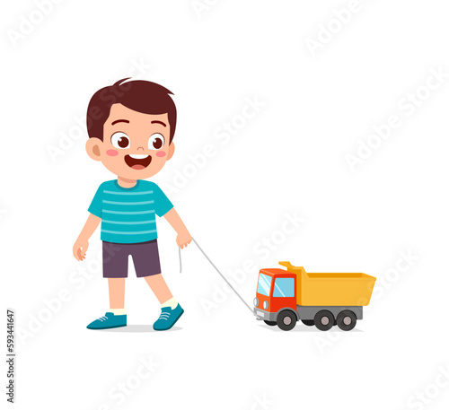 little kid playing a toy truck and feel happy