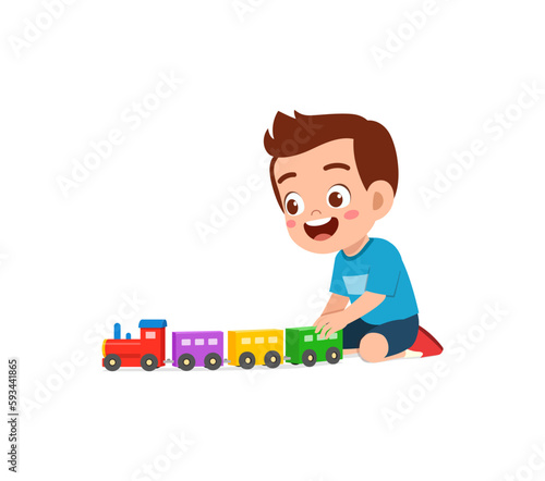 little kid playing toy train made from plastic and feel happy