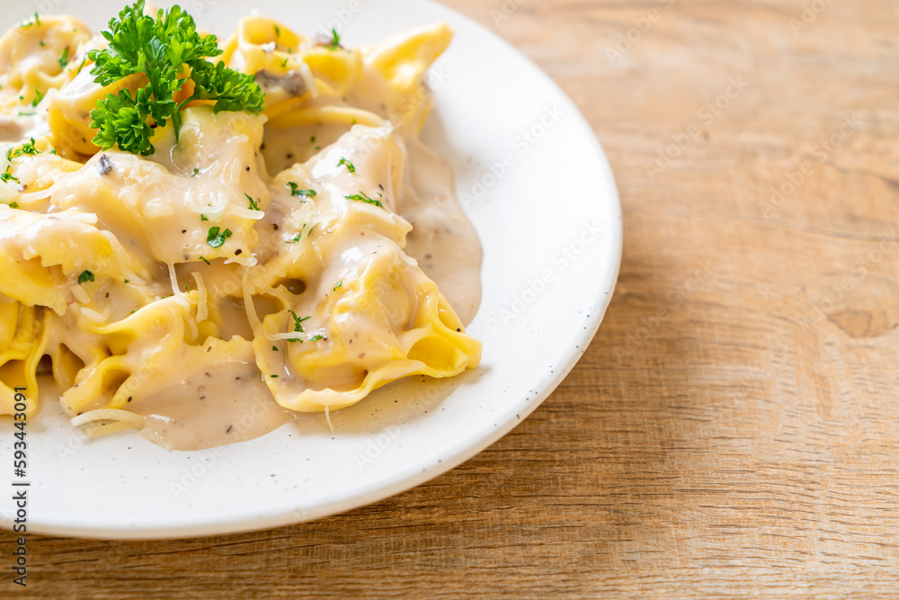 tortellini pasta with mushroom cream sauce and cheese tortellini pasta with mushroom cream sauce and cheese