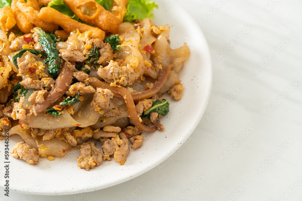 Stir-fried noodle with minced chicken and basil Stir-fried noodle with minced chicken and basil