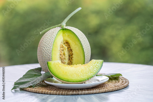 Картината върху платно Crown Musk Melon on nature background, Shizuoka Crown Melon Yama Grade on Green bokeh background
