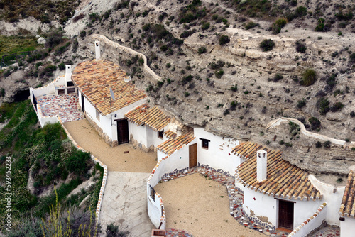 Traditional cavehouses in the city of Galera near Baza, unspoilt cave country in mountainous region of northern Andalusia, Galera, Huéscar, Granada, Andalusia, Spain, Europe photo