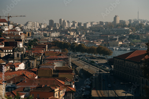 View over the old town of Porto, Portugal with the cathedral, colorful buildings and orange roofs