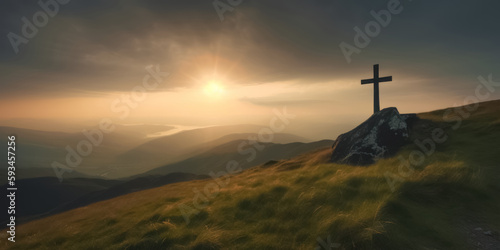 A Cross Silhouetted Against a Colorful Mountain Sunset