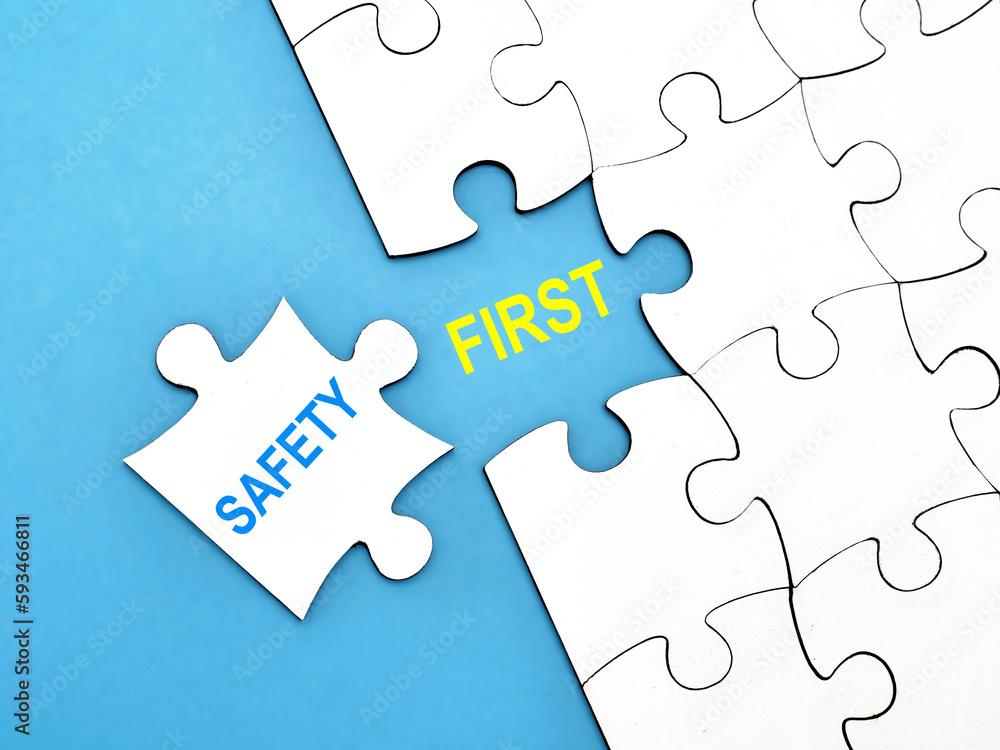 Safety First, text words typography written under jigsaw puzzle, life and business motivational inspirational Safety First, text words typography written under jigsaw puzzle, life and business motivational inspirational