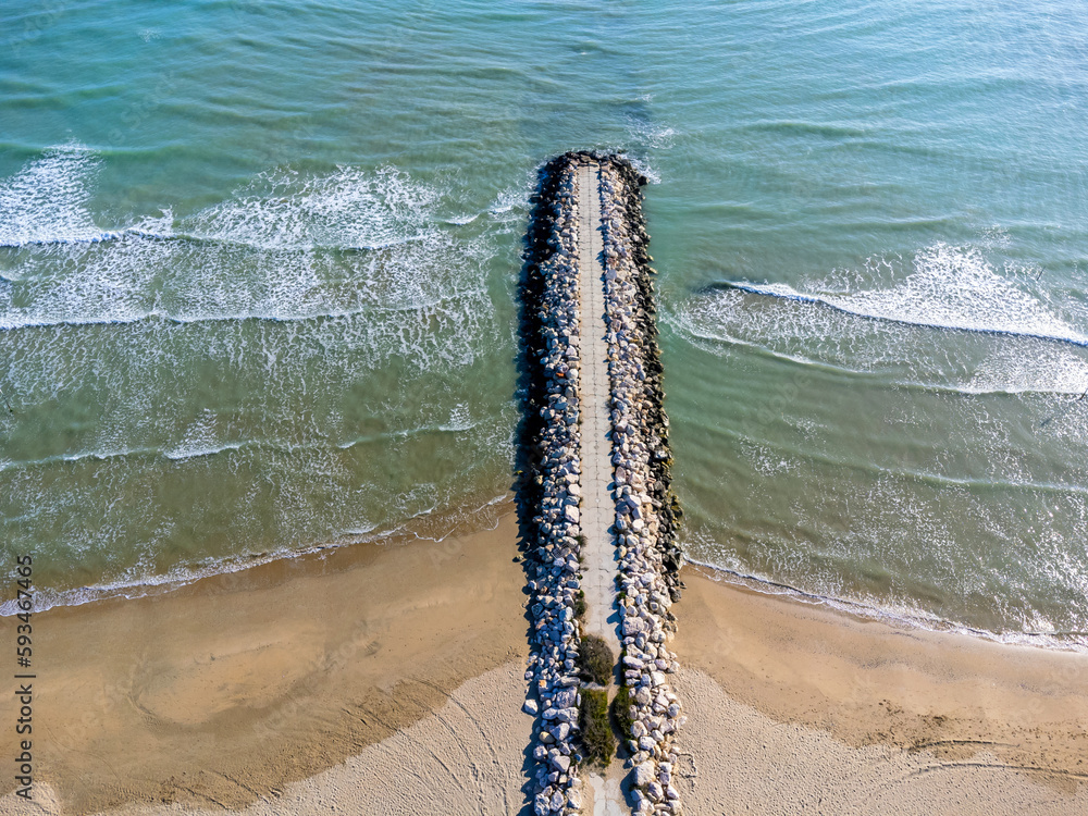Aerial view landscape. Italy Pescara. Sea, waves, sand , empty beach, stones.