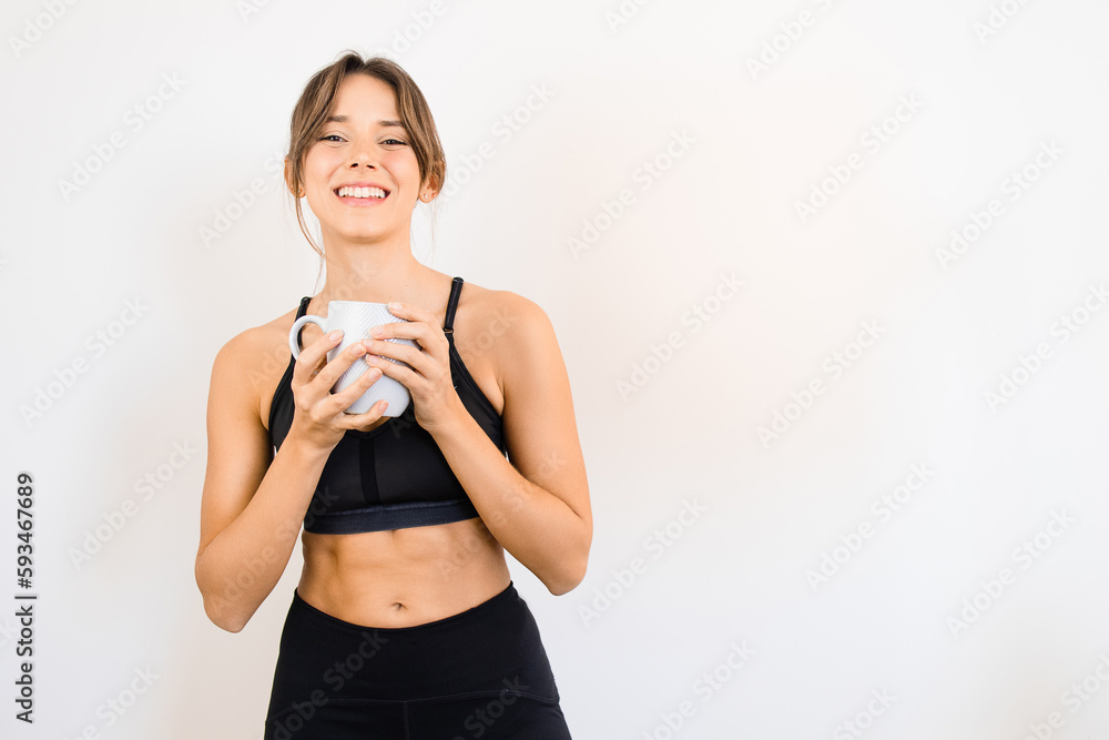 Sporty Woman Holding a Mug Drinking Tea Coffee Detox Healthy Lifestyle Sporty Woman Holding a Mug Drinking Tea Coffee Detox Healthy Lifestyle