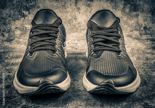 Sneakers on grunge background. Sport and fitness concept.
