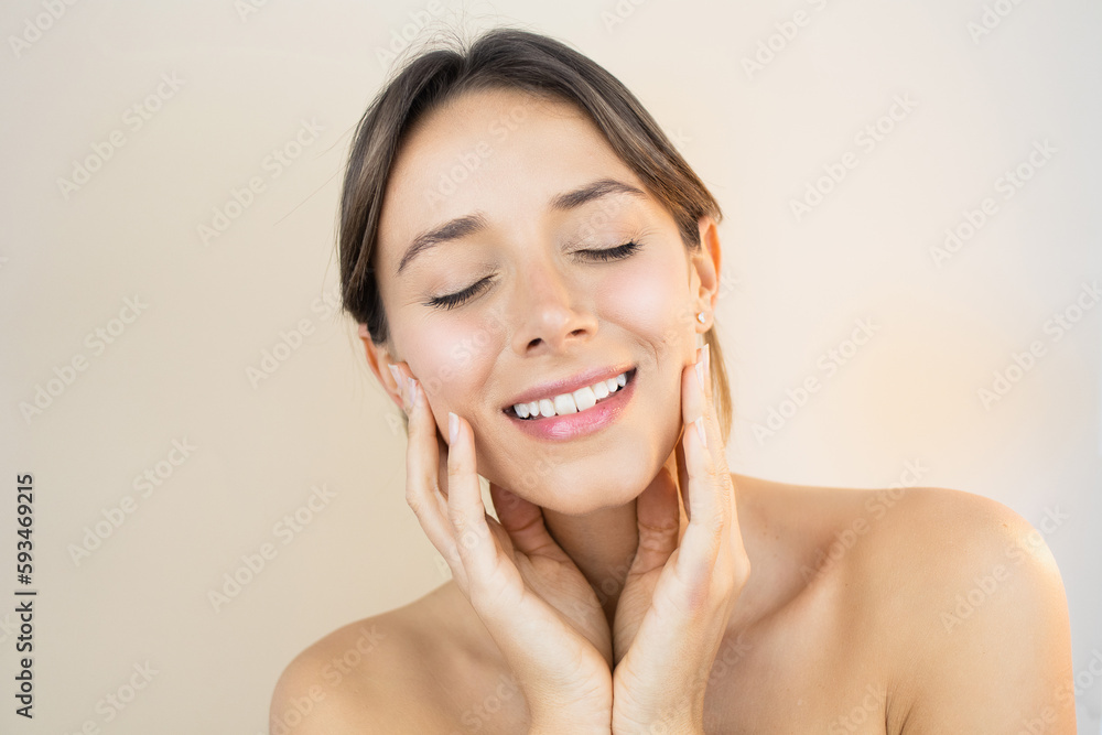 Happy Young Woman With Glowy Skin Eyes Closed Touching her Face with Flawless Healthy and Bright No-Makeup Makeup Look Happy Young Woman With Glowy Skin Eyes Closed Touching her Face with Flawless Healthy and Bright No-Makeup Makeup Look