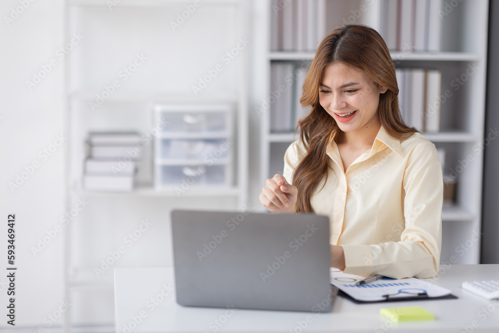 Asian Business woman using calculator and laptop for doing math finance on an office desk, tax, report, accounting, statistics, and analytical research concept
Asian Business woman using calculator and laptop for doing math finance on an office desk, tax, report, accounting, statistics, and analytical research concept