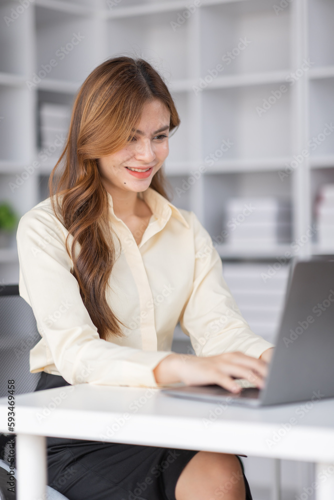 Asian Business woman using calculator and laptop for doing math finance on an office desk, tax, report, accounting, statistics, and analytical research concept
Asian Business woman using calculator and laptop for doing math finance on an office desk, tax, report, accounting, statistics, and analytical research concept