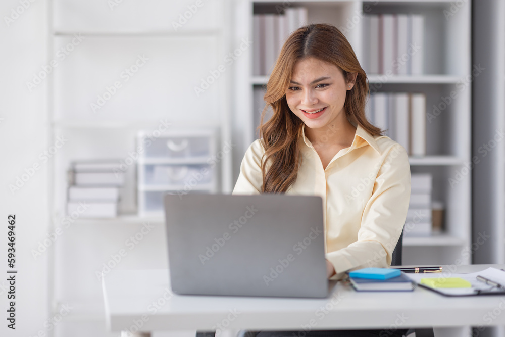 Asian Business woman using calculator and laptop for doing math finance on an office desk, tax, report, accounting, statistics, and analytical research concept
Asian Business woman using calculator and laptop for doing math finance on an office desk, tax, report, accounting, statistics, and analytical research concept