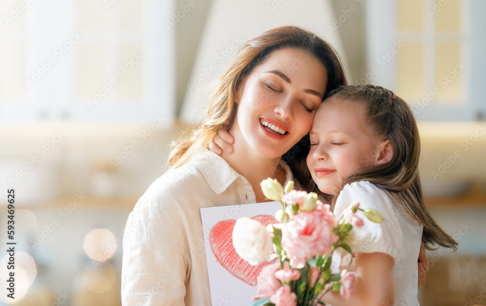 Daughters giving mother bouquet of flowers. Daughters giving mother bouquet of flowers.