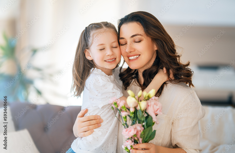 Daughter giving mother bouquet of flowers. Daughter giving mother bouquet of flowers.