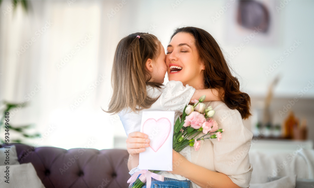 Daughter giving mother bouquet of flowers. Daughter giving mother bouquet of flowers.