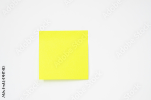 Green paper on white background.