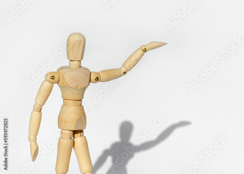 Wooden man on white background shows space for copy and text