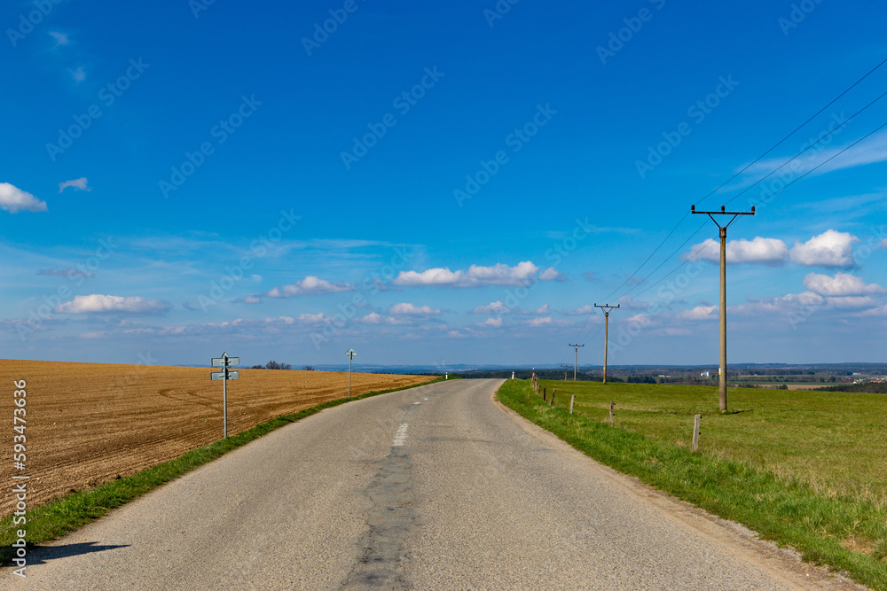 Rural road between agricultural fields, Czech Republic Rural road between agricultural fields, Czech Republic