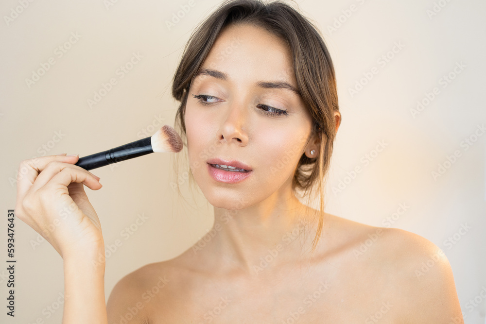 Woman Applying Makeup with Makeup Brush and a No-Makeup Makeup Look with Glowy and Healthy Skin Perfect Complexion Blush Contouring Woman Applying Makeup with Makeup Brush and a No-Makeup Makeup Look with Glowy and Healthy Skin Perfect Complexion Blush Contouring