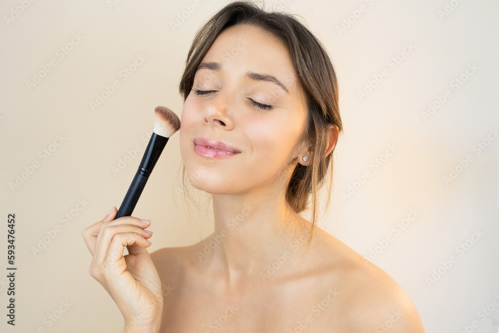 Woman Applying Makeup with Makeup Brush and a No-Makeup Makeup Look with Glowy and Healthy Skin Perfect Complexion Blush Contouring Woman Applying Makeup with Makeup Brush and a No-Makeup Makeup Look with Glowy and Healthy Skin Perfect Complexion Blush Contouring