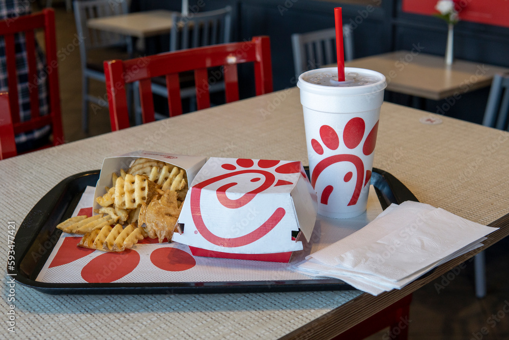 Chickfila food on the table in fast food restaurant. Chick fil a