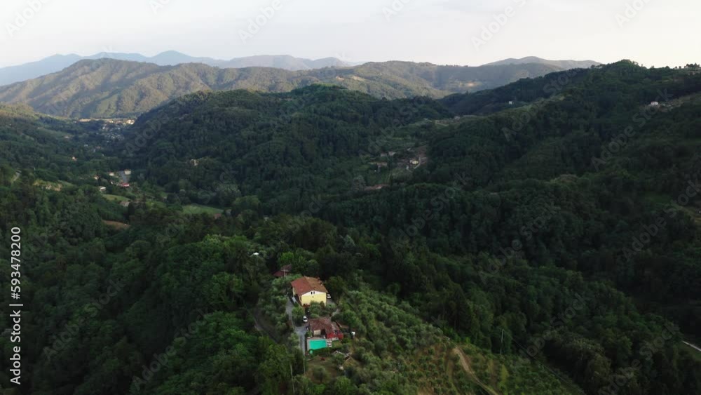 Aerial view of Tuscany rolling hills house at sunset Italy Aerial view of Tuscany rolling hills house at sunset Italy