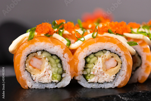 Sushi roll on dark background. Japanese and asian food concept