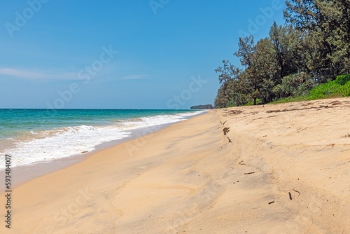 Picture of deserted Natai beach in Thailand during the day with white sand and turquoise blue water © Aquarius